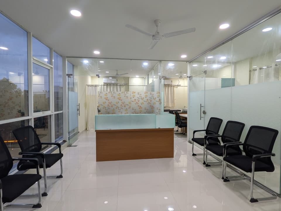 Reception desk and patient waiting area at Dr. Abhijeet Bhosikar's rheumatology clinic in Ravet, Pimpri-Chinchwad
